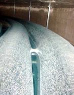 На фото видно образование льда на трубах теплообменника, это изображение получено в экспериментальном режиме тестирования системы.